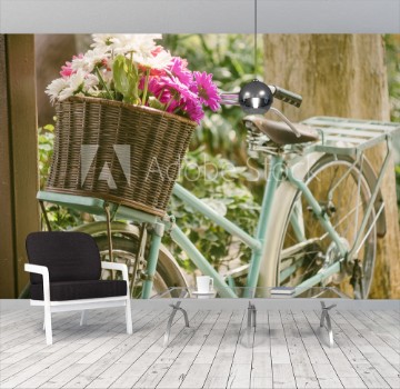 Picture of Vintage bicycle with flowers in front basket
